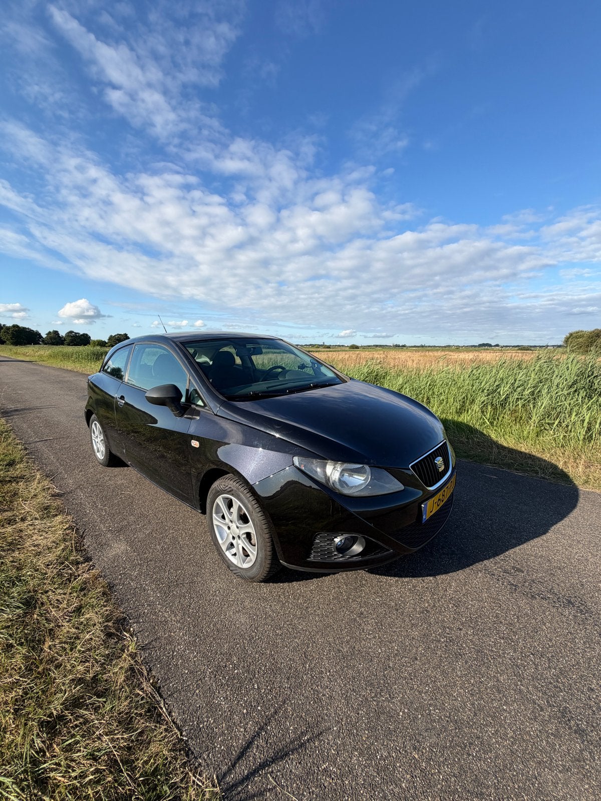 Seat Ibiza 1.4 63KW 3DRS uitstekende airco 2009 Zwart, Auto's, Voorwielaandrijving, 40 €/maand, 4 cilinders, Handgeschakeld