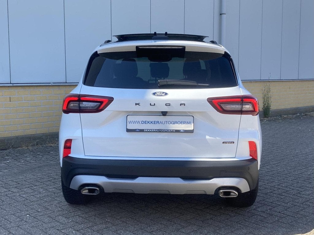 Ford Kuga 2.5 PHEV 243 pk Active X Elektrisch wegklapbare tr, Auto's, Ford, 14 kWh, Gebruikt, Leder en Stof, Wit