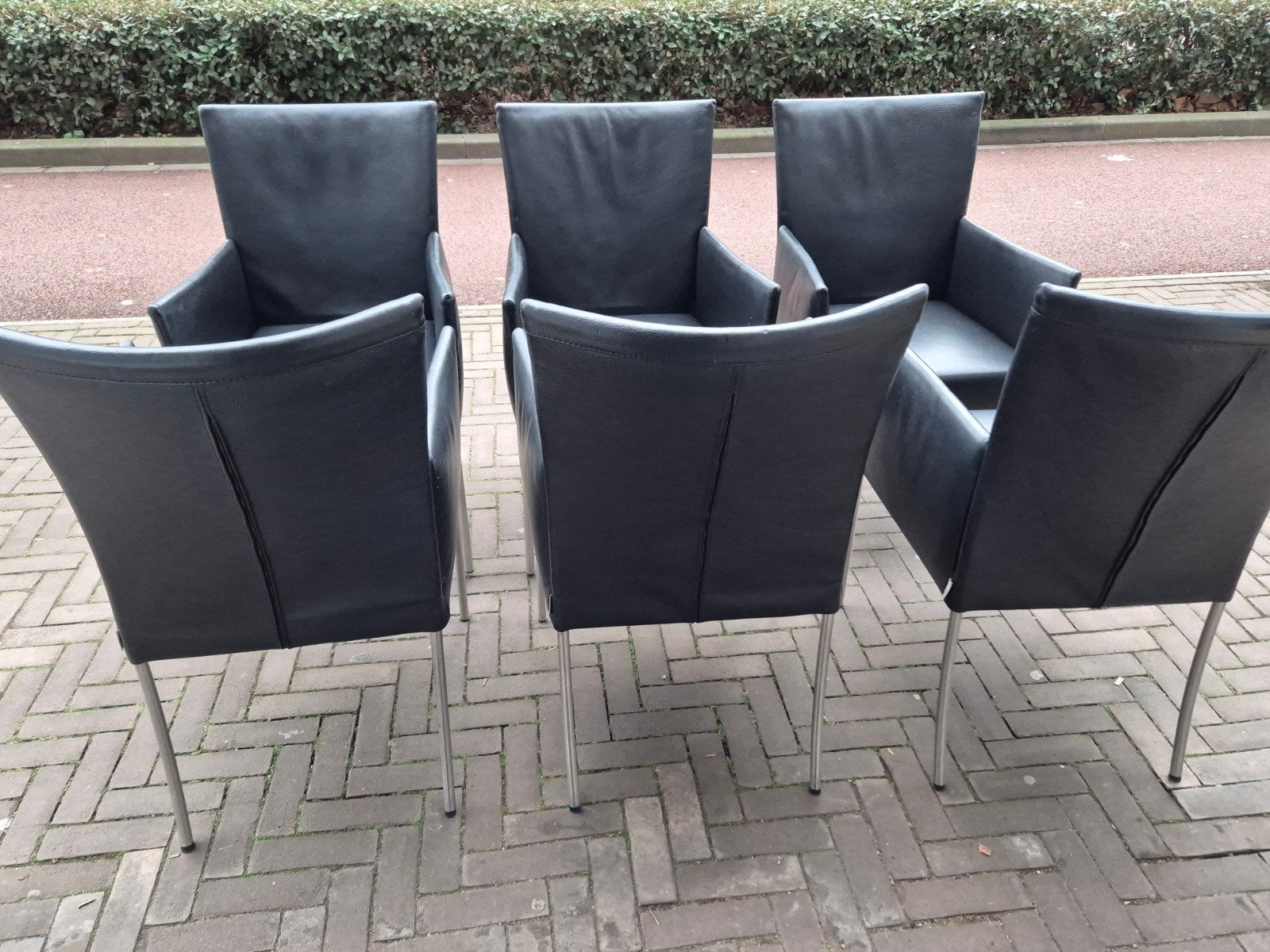 6 Bert plantagie design eetkamerstoelen Arc zwart leer rvs, Huis en Inrichting, Stoelen, Ophalen, Gebruikt, Zwart, Vijf, Zes of meer stoelen