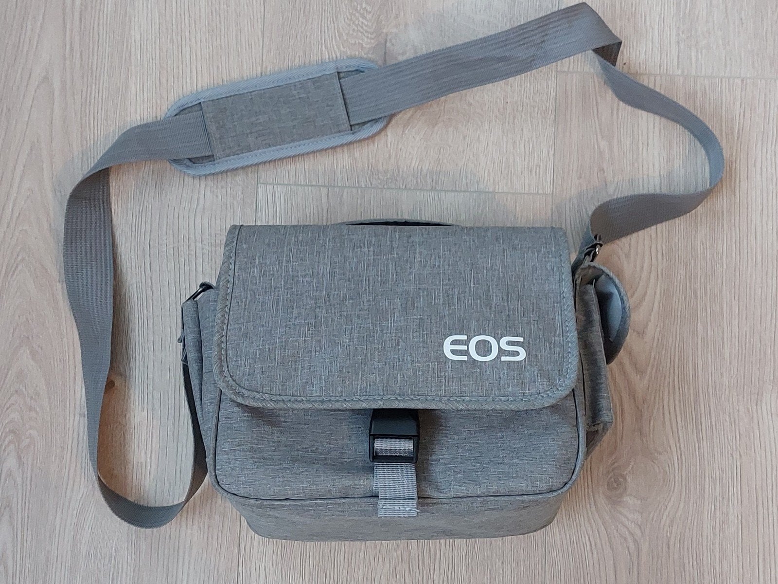 Nieuwe grijze camera tas 'EOS', Overige merken, Nieuw, Ophalen of Verzenden, Heuptas