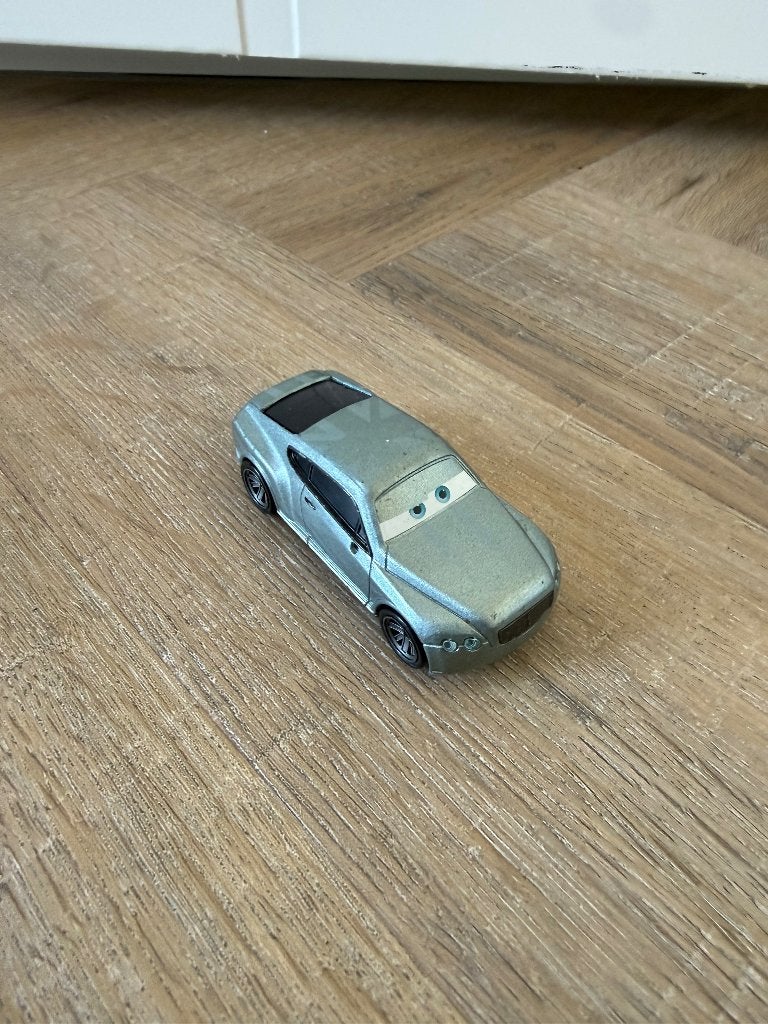 Heel goed Disney Cars 2 Prince Wheeliam zilver Bentley auto, Ophalen of Verzenden, Zo goed als nieuw