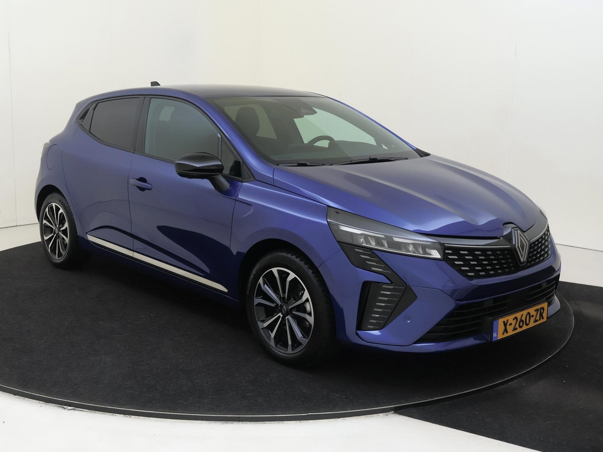 Renault Clio 1.6 E-Tech Full Hybrid 145 techno | Automaat |, Auto's, Gebruikt, Euro 6, Blauw, Leder en Stof