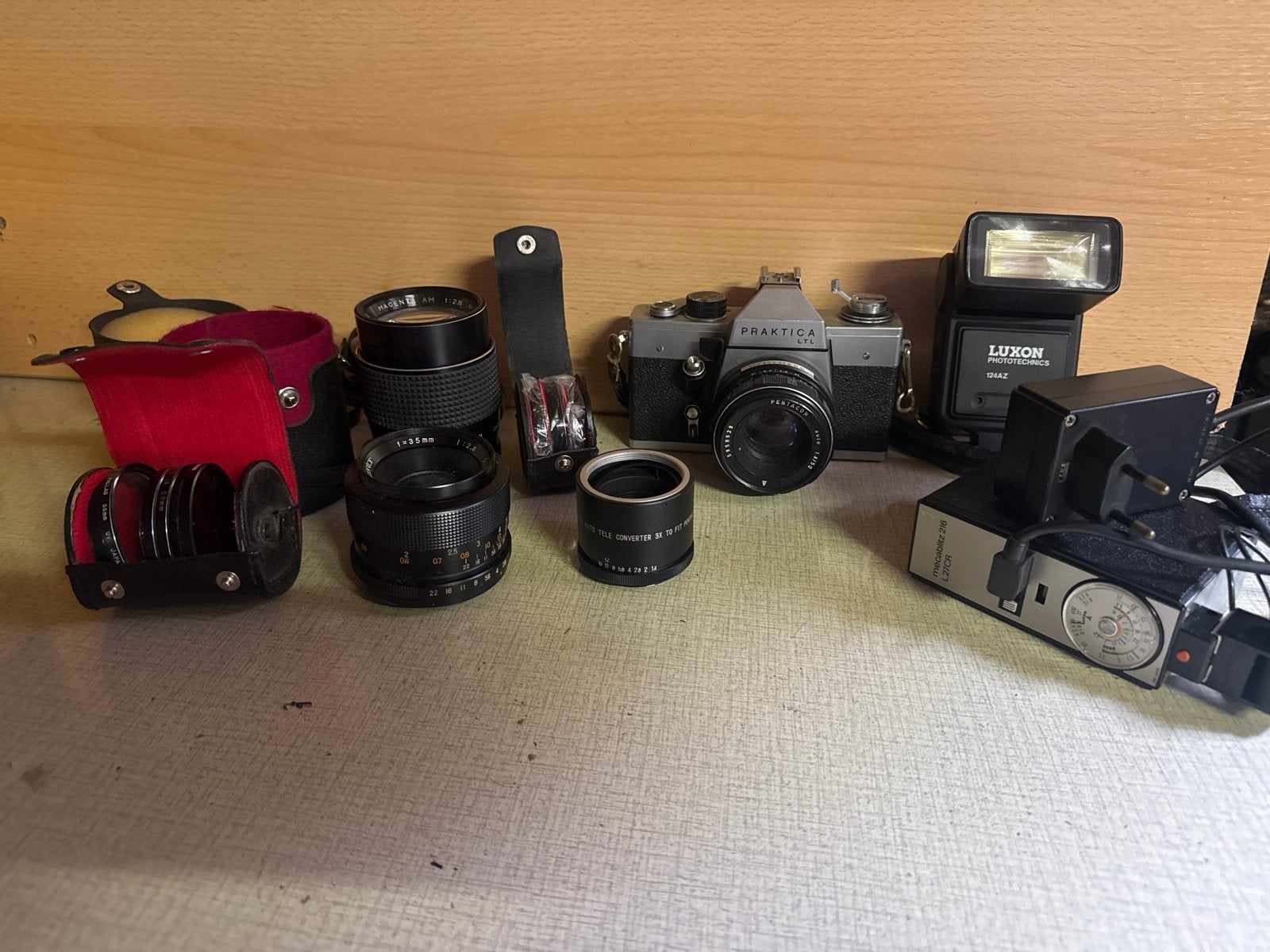 Oude Praktica camera met diverse lenzen, flitser en ontspann, Ophalen, Gebruikt, Spiegelreflex, Overige Merken