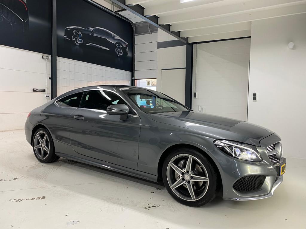 Mercedes-Benz C-Klasse 2.0 C200 Coupe Distronic Plus, Auto's, Achterwielaandrijving, 1800 kg, Zwart, 4 cilinders