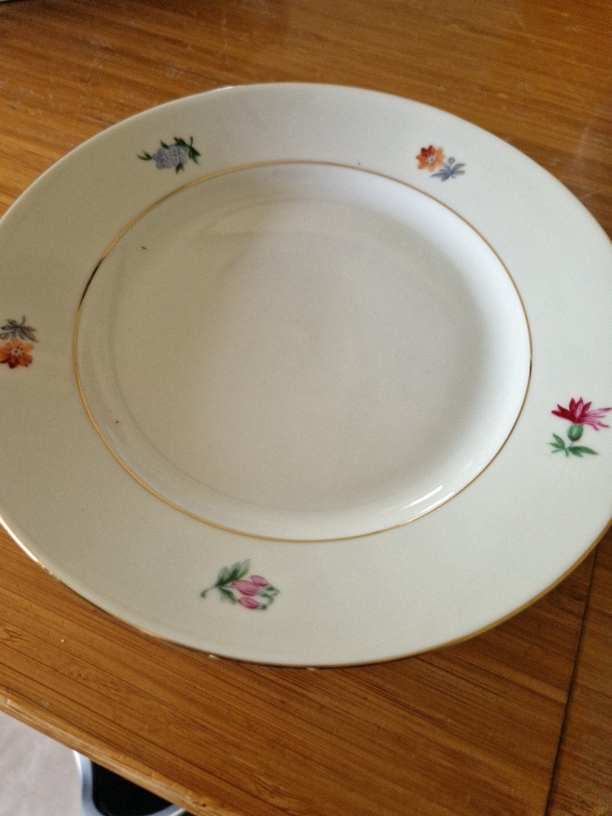 Vintage porseleinen servies met bloemmotief en gouden rand, Ophalen