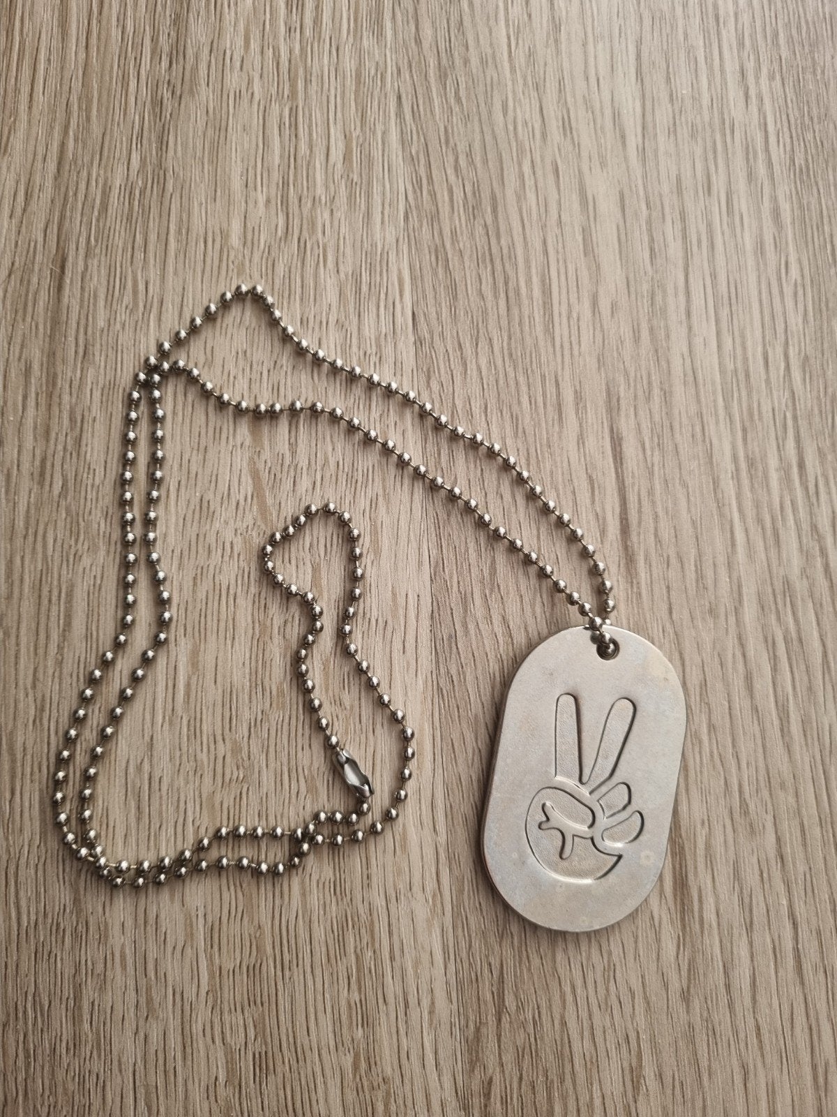Knolpower ketting met KP logo en vredesteken, Sieraden, Tassen en Uiterlijk, Gebruikt, Ophalen of Verzenden, Zilver, Overige materialen