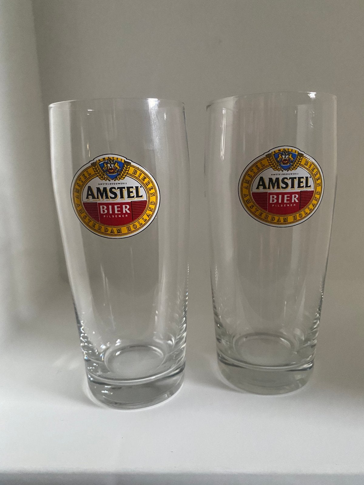 2 Bierglazen van Amstel. Hoogte 13 cm., Verzamelen, Biermerken, Zo goed als nieuw, Glas of Glazen, Amstel, Ophalen of Verzenden