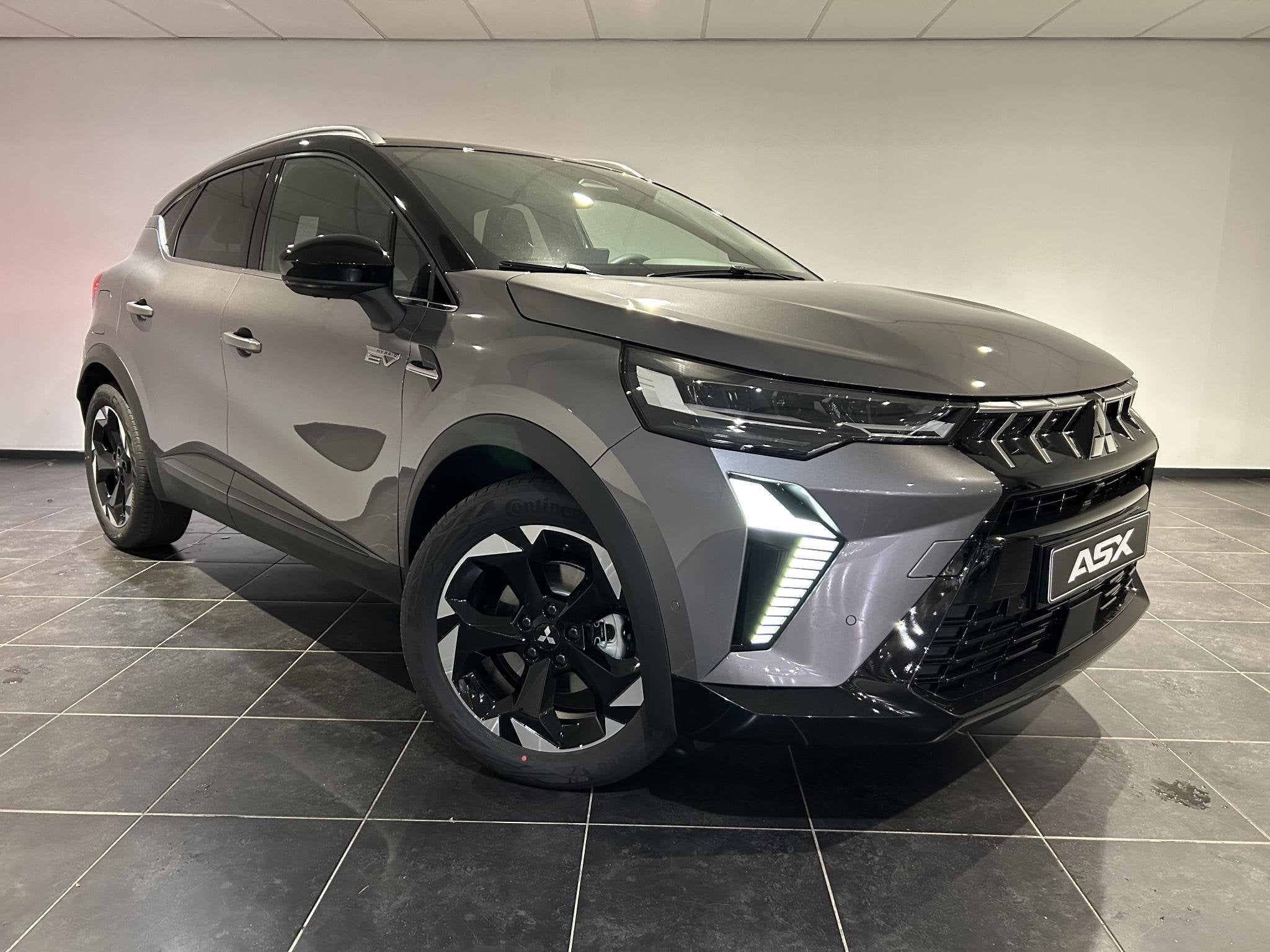Mitsubishi ASX 1.8 HEV AT Executive | Demo | Navigatie | 360, Auto's, Stof, Euro 6, 4 cilinders, 23 km/l