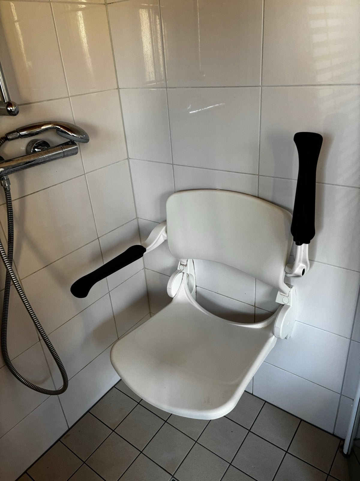 Linido douchestoel wand, Ophalen