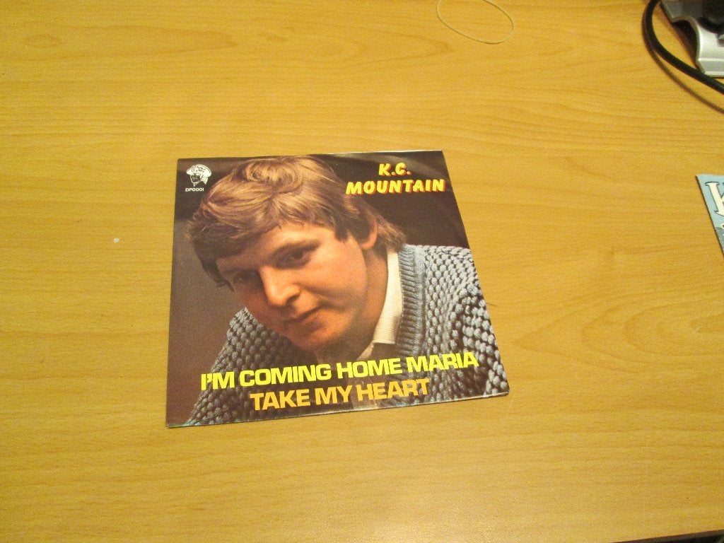 2 singles van K.C. Mountain (ook per stuk te koop), Ophalen of Verzenden, Gebruikt, Pop