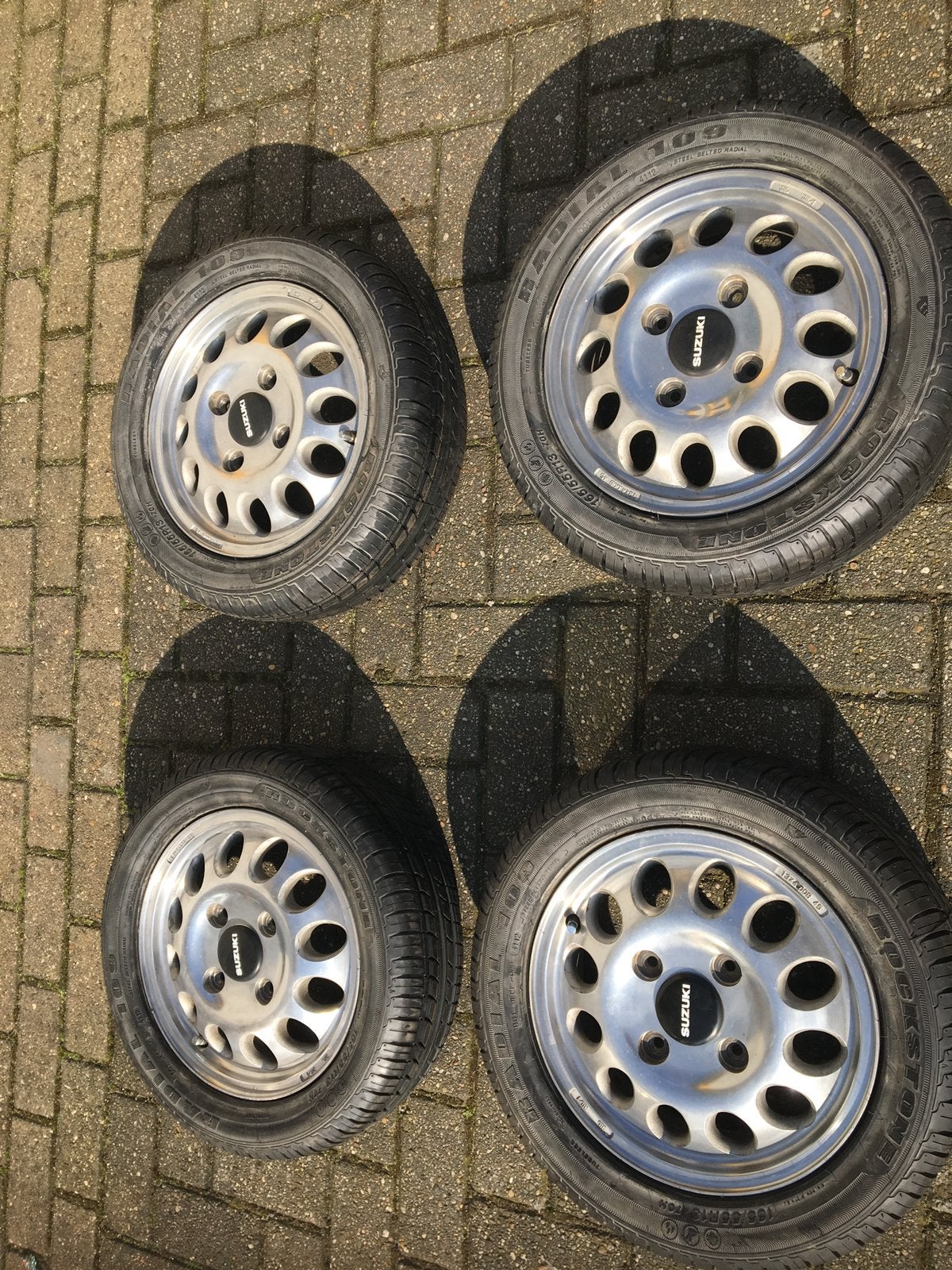 Suzuki Alto MK3 13 inch velgen met nieuwe banden, Auto diversen, Ophalen
