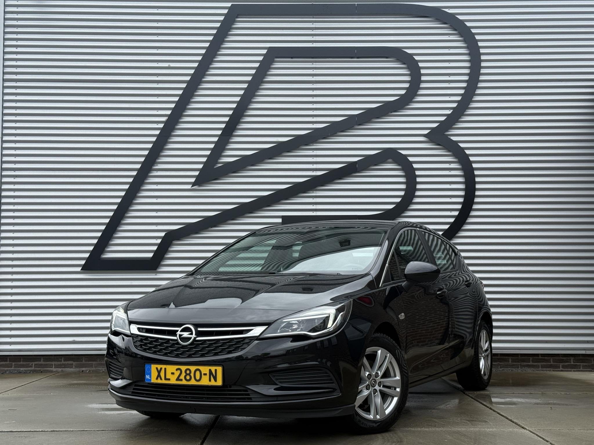 Opel Astra 1.0 Business+ Navi|Clima|Cruise|PDC|N.A.P|APK tot, Gebruikt, 610 kg, Origineel Nederlands, Bedrijf