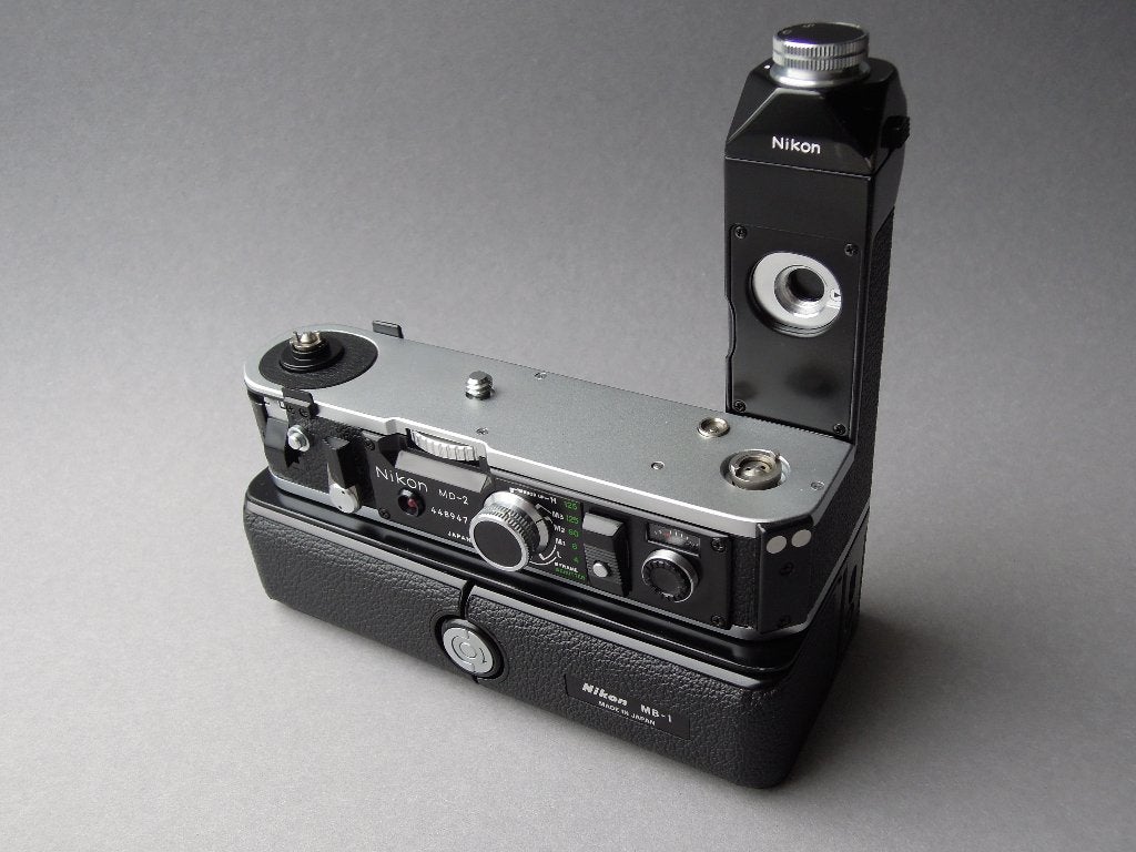 Nikon MD-2, MB-1 Mint-  (Sover Wong gereviseerd), Audio, Tv en Foto, Fotocamera's Analoog, Ophalen of Verzenden, Refurbished, Spiegelreflex