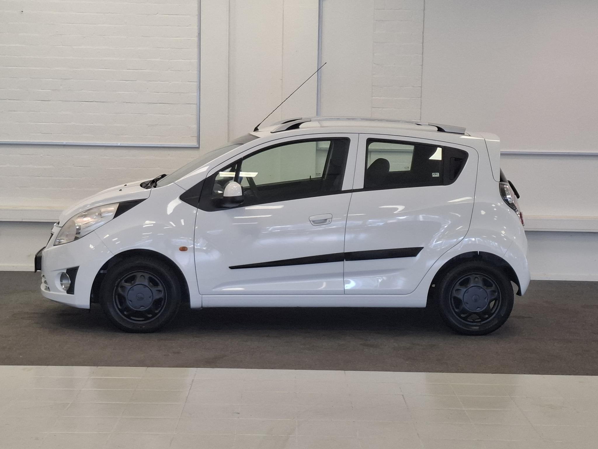Chevrolet Spark 1.0i 16V LS Bi-Fuel Garantie APK 9-2027 Airc, Auto's, Euro 5, Stof, 4 cilinders, Wit