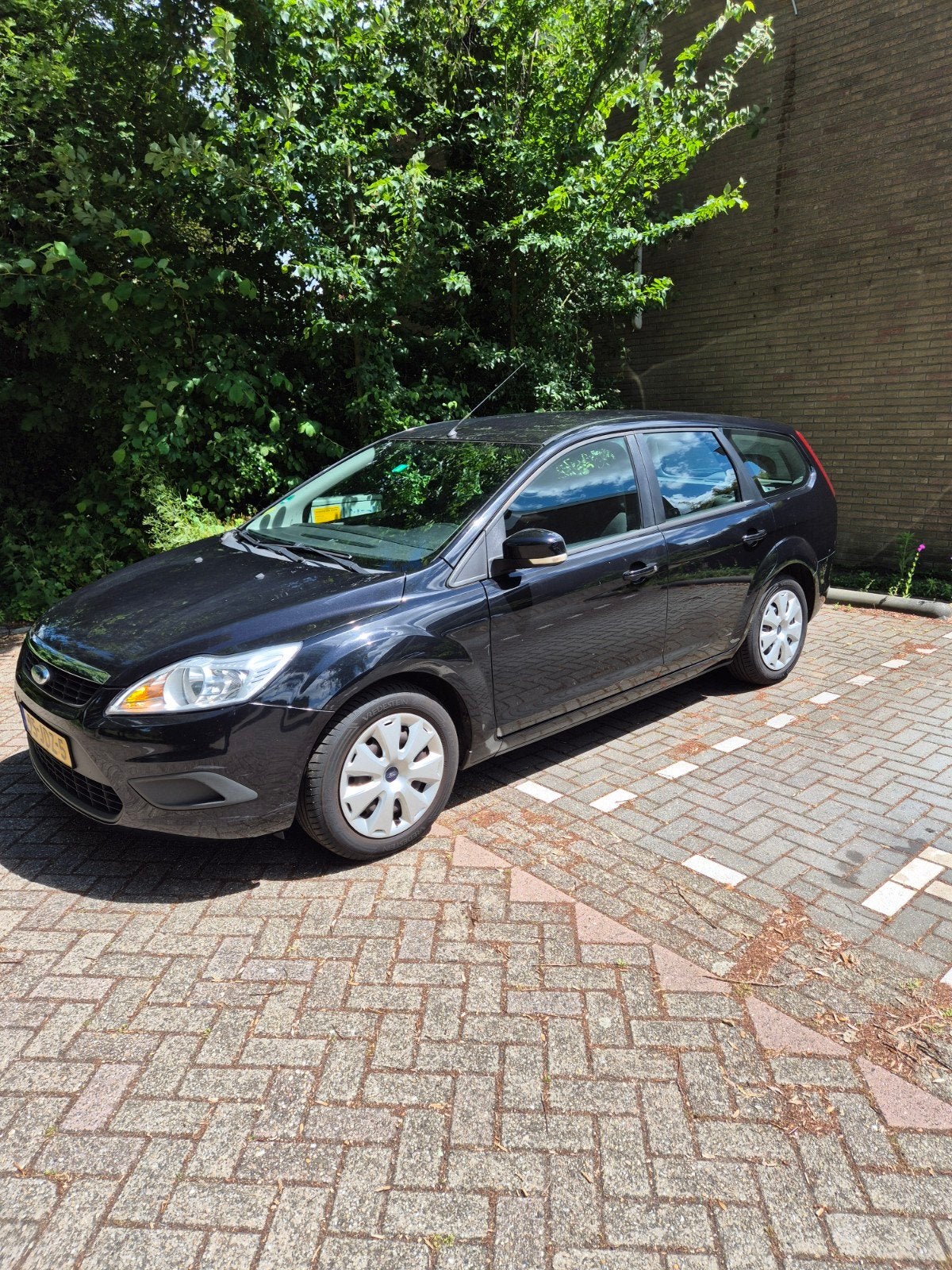 Ford Focus 1.4 59KW Wagon 2009 Zwart, Auto's, 15 km/l, 4 cilinders, 635 kg, Zwart