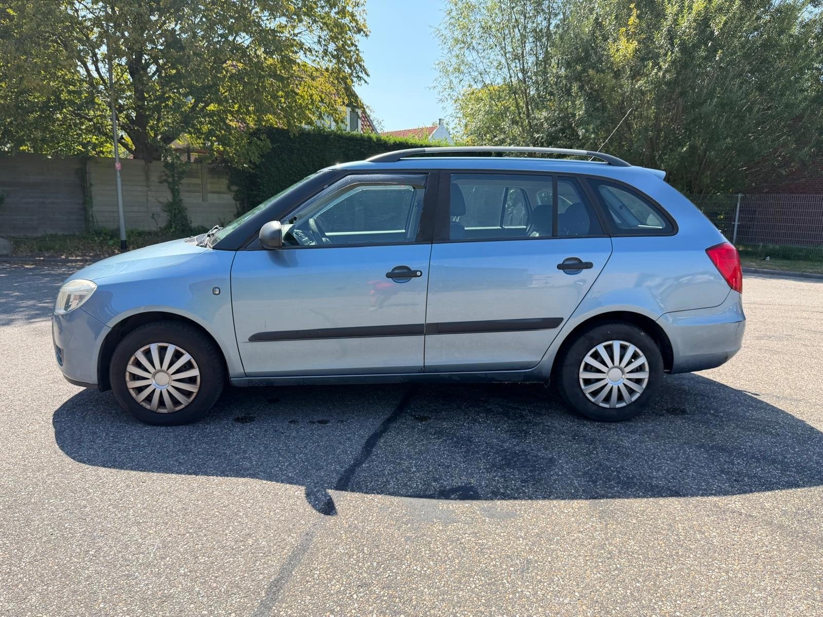 Skoda Fabia Combi 1.2-12V Ambition Business Line Achteruit c, Voorwielaandrijving, 450 kg, Blauw, 1198 cc
