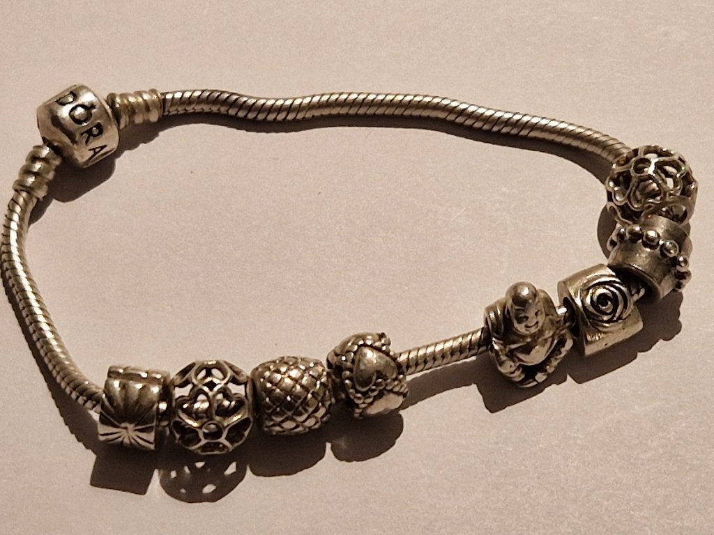 Originele Pandora armband met 7 bedels en slotkraal, Sieraden, Tassen en Uiterlijk, Gebruikt, Ophalen of Verzenden, Met bedels of kralen