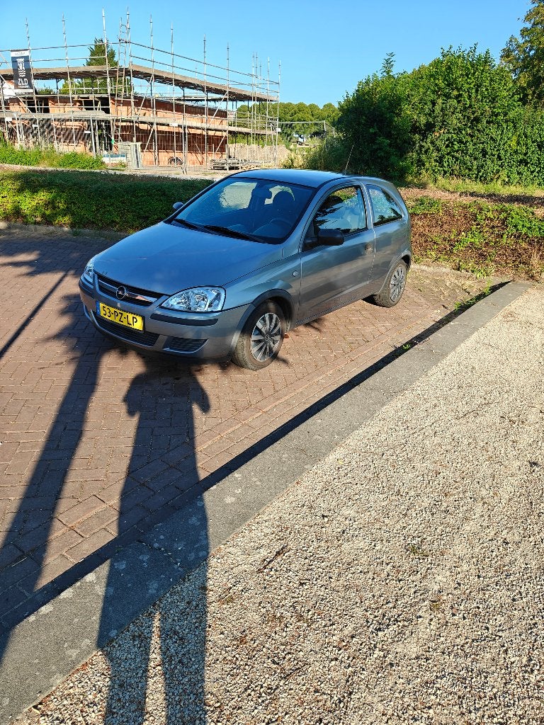 Opel Corsa 1.2 16V 2005 Grijs, Auto's, Voorwielaandrijving, 4 cilinders, 1229 cc, Origineel Nederlands