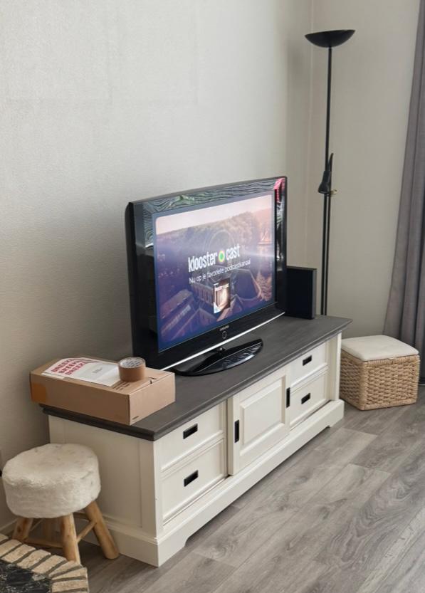 Tv met tv kast, Ophalen