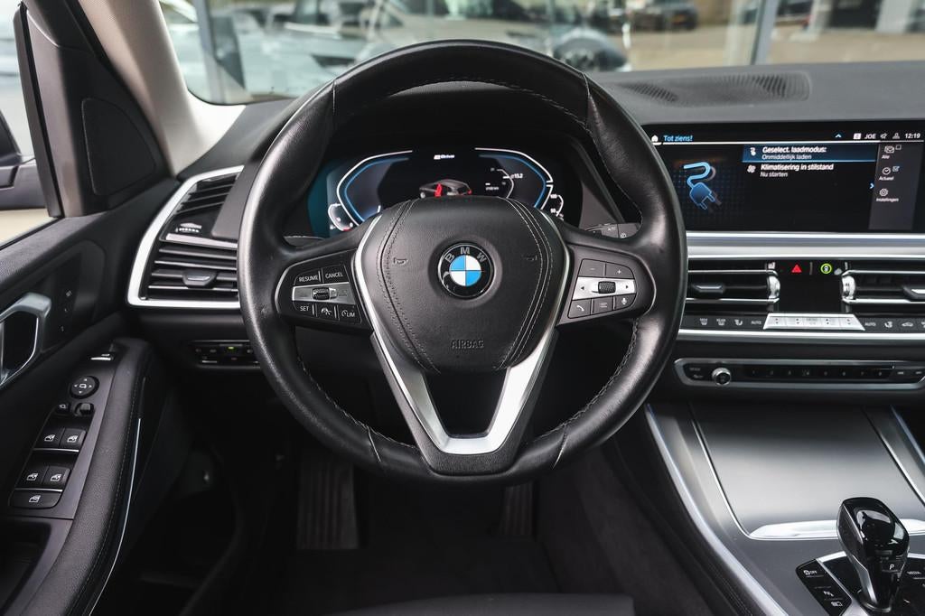 BMW X5 xDrive45e Executive Automaat / Sportstoelen / Achteru, Gebruikt, 394 pk, Zwart, Vierwielaandrijving