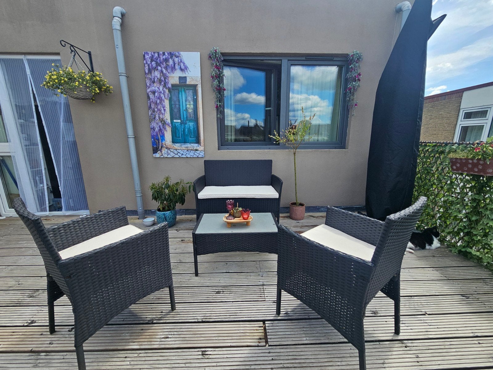 Comfortabele 4-delige zwarte wicker loungeset met kussens, Tuin en Terras, Tuinsets en Loungesets, Gebruikt, Loungeset, Wicker