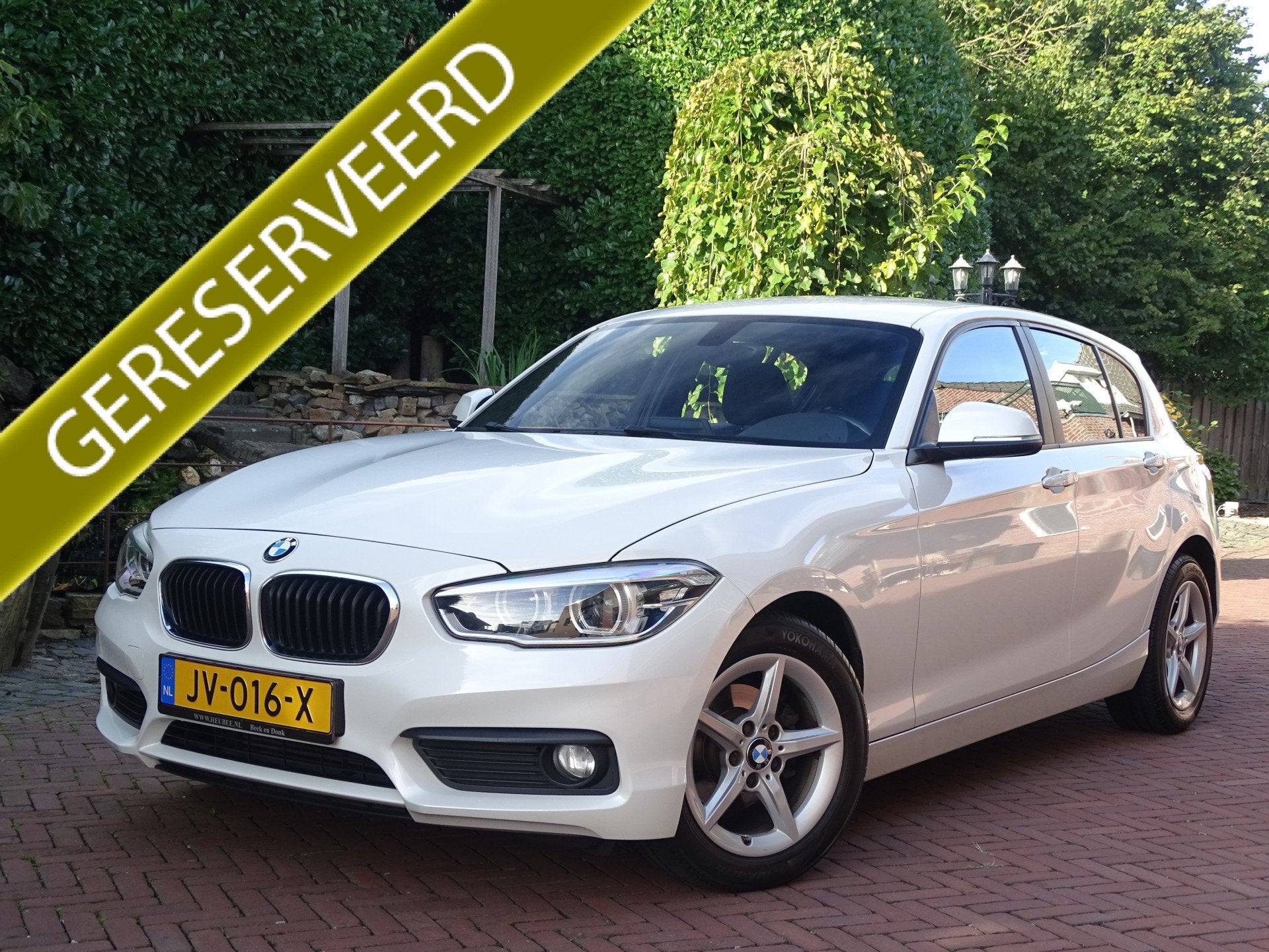 BMW 1-serie 118i Executive Automaat 1ste eig. Nw staat, Auto's, Dealer onderhouden, Gebruikt, Wit, Bedrijf