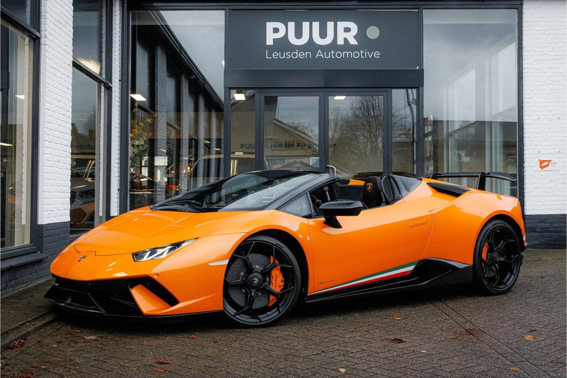 Lamborghini Huracan 5.2 V10 Performante Spyder Arancio Borea, Auto's, Lamborghini, Automaat, Gebruikt, Zwart, Cabriolet