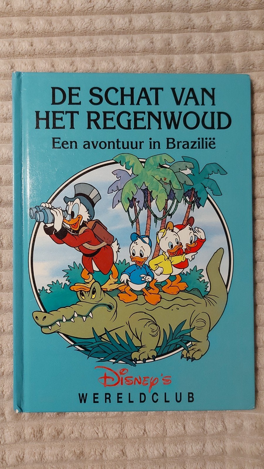 De Schat van het Regenwoud - Disney's Wereldclub, Boeken, Ophalen of Verzenden, Zo goed als nieuw, Walt Disney Productions