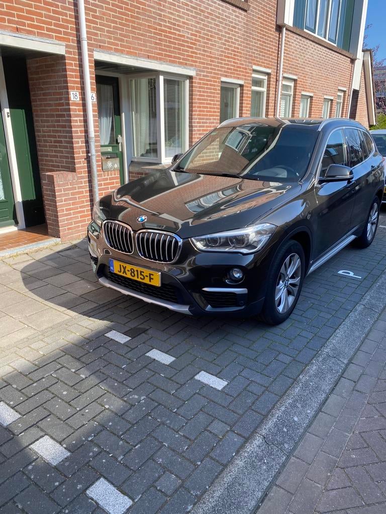 BMW X1 2.0 Sdrive 20I AUT 2016 Bruin, Auto's, BMW, 1998 cc, 1800 kg, Bruin, Bruin