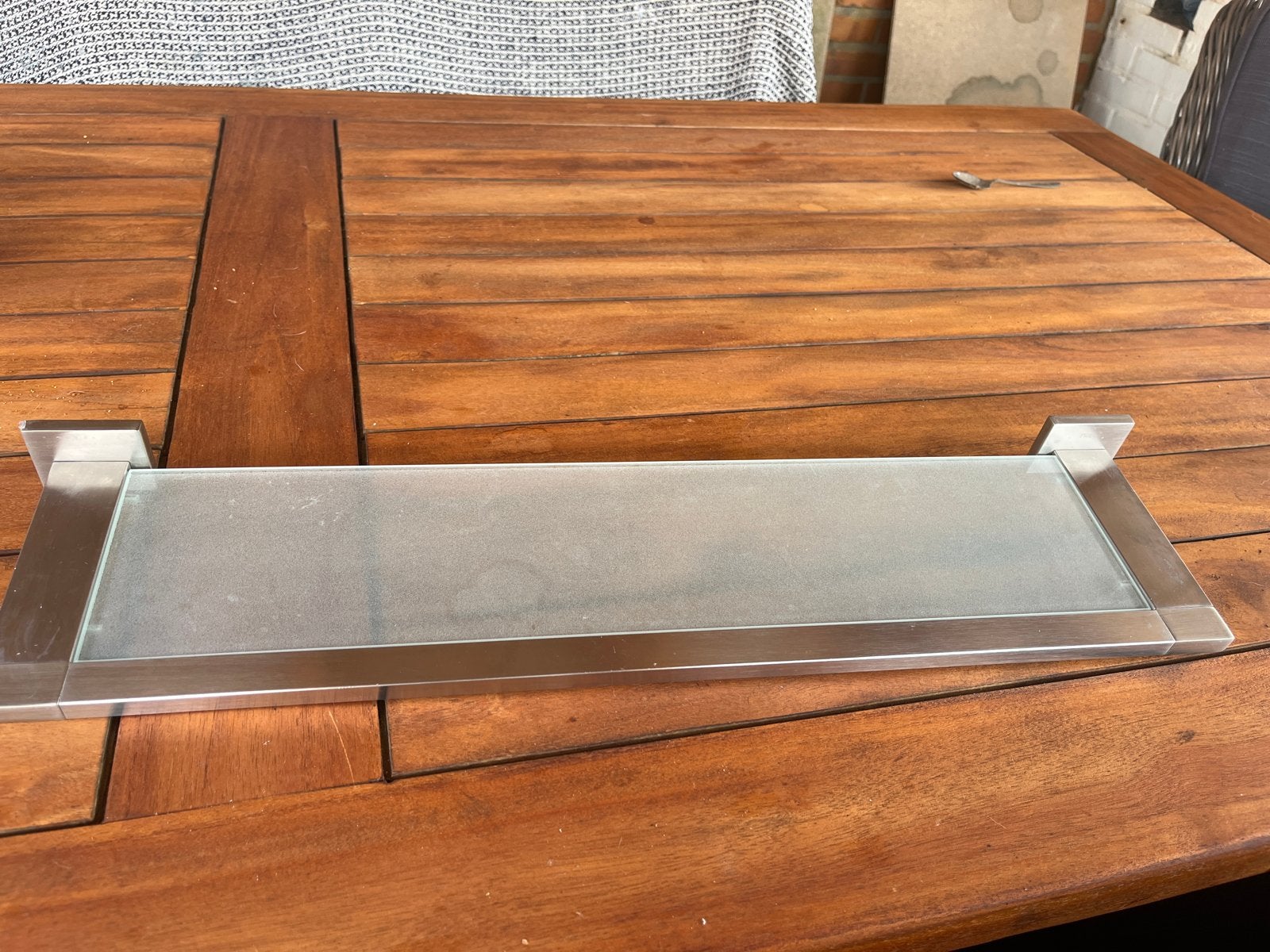 Tiger planchet rvs en glas 59 x 14 cm, Badkamerrek, Gebruikt, Overige merken, Ophalen of Verzenden