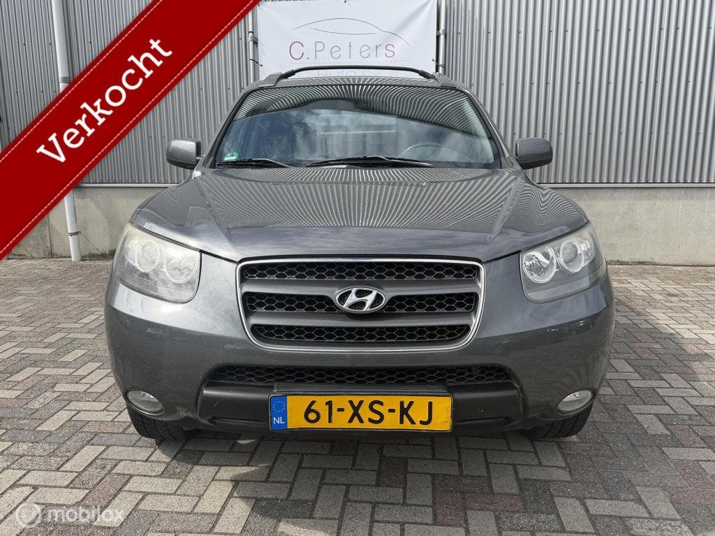 Hyundai Santa Fe 2.7i V6 Dynamic 2007 Navigatie / Bluetooth, Auto's, Hyundai, Voorwielaandrijving, Gebruikt, 2000 kg, Bedrijf