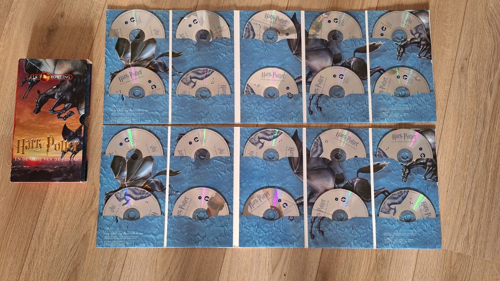 Harry Potter en de Orde van de Feniks Luisterboek CD's, Boeken, Ophalen of Verzenden, J.K. Rowling, Cd, Volwassene