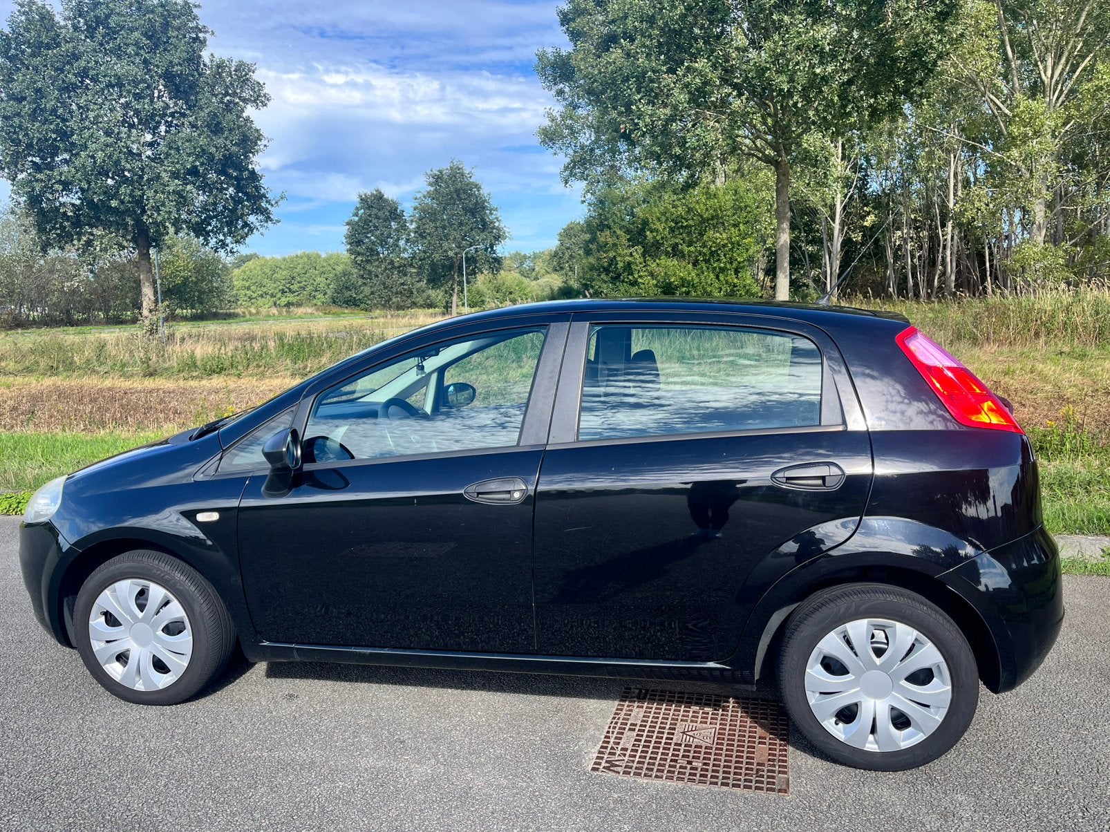 Fiat Punto 1.2 5DR 2007 Zwart, Auto's, 1005 kg, Stof, 40 €/maand, 4 cilinders