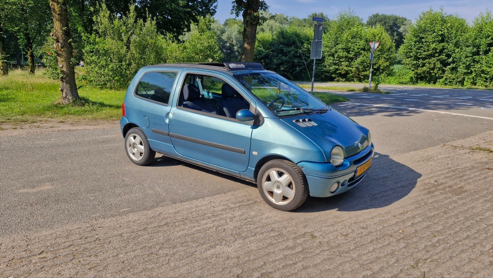 Renault Twingo 1.2 2005 2004 Blauw, Auto's, Renault, Voorwielaandrijving, Multifunctioneel stuurwiel, 600 kg, 4 cilinders