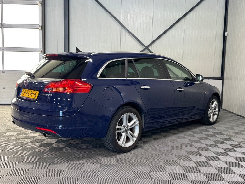 Opel Insignia Sports Tourer 2.0 Turbo Aut | Cosmo 4x4 | Airc, Auto's, Opel, Automaat, Navigatiesysteem, 4 cilinders, Blauw