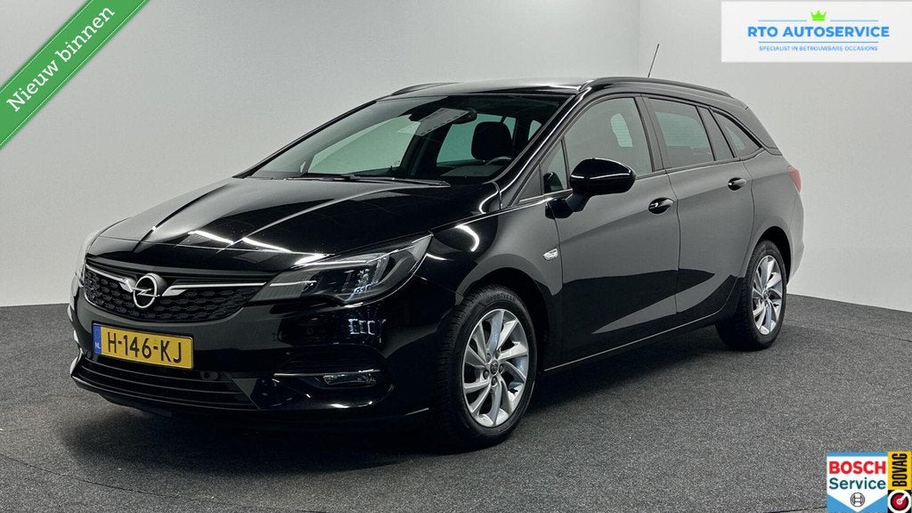 Opel Astra Sports Tourer 1.2 Business Edition ECC CAMERA LM, Auto's, Opel, Voorwielaandrijving, Stof, 1199 cc, Met garantie (alle)