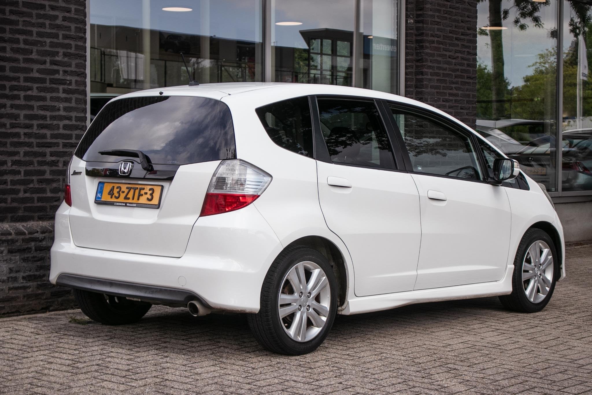 Honda Jazz 1.4 Comfort, Auto's, Gebruikt, 4 cilinders, 1055 kg, Bedrijf