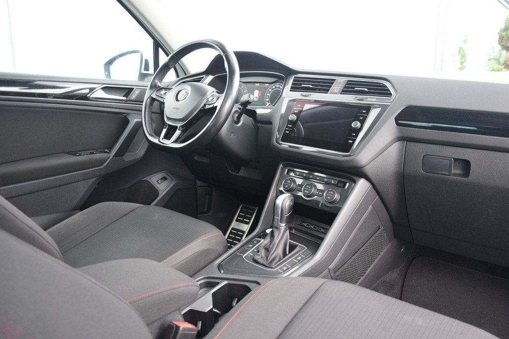 Volkswagen Tiguan 1.4 TSI ACT Comfortline Business R Sound C, Stof, 4 cilinders, 150 pk, Wit