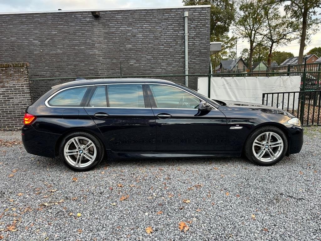 Foto 3 van BMW 5-serie Touring 520i High Executive netteauto/keurigonde
