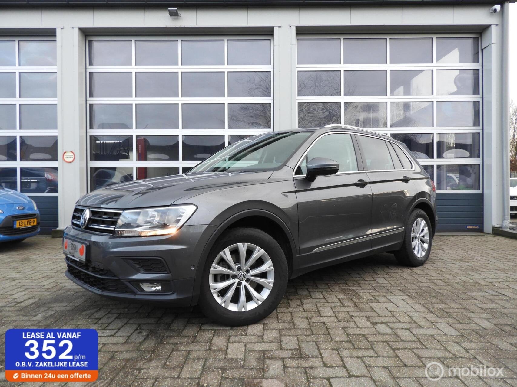 Volkswagen Tiguan 1.4 TSI Comfortline 150 PK, Auto's, Gebruikt, 4 cilinders, 150 pk, Leder