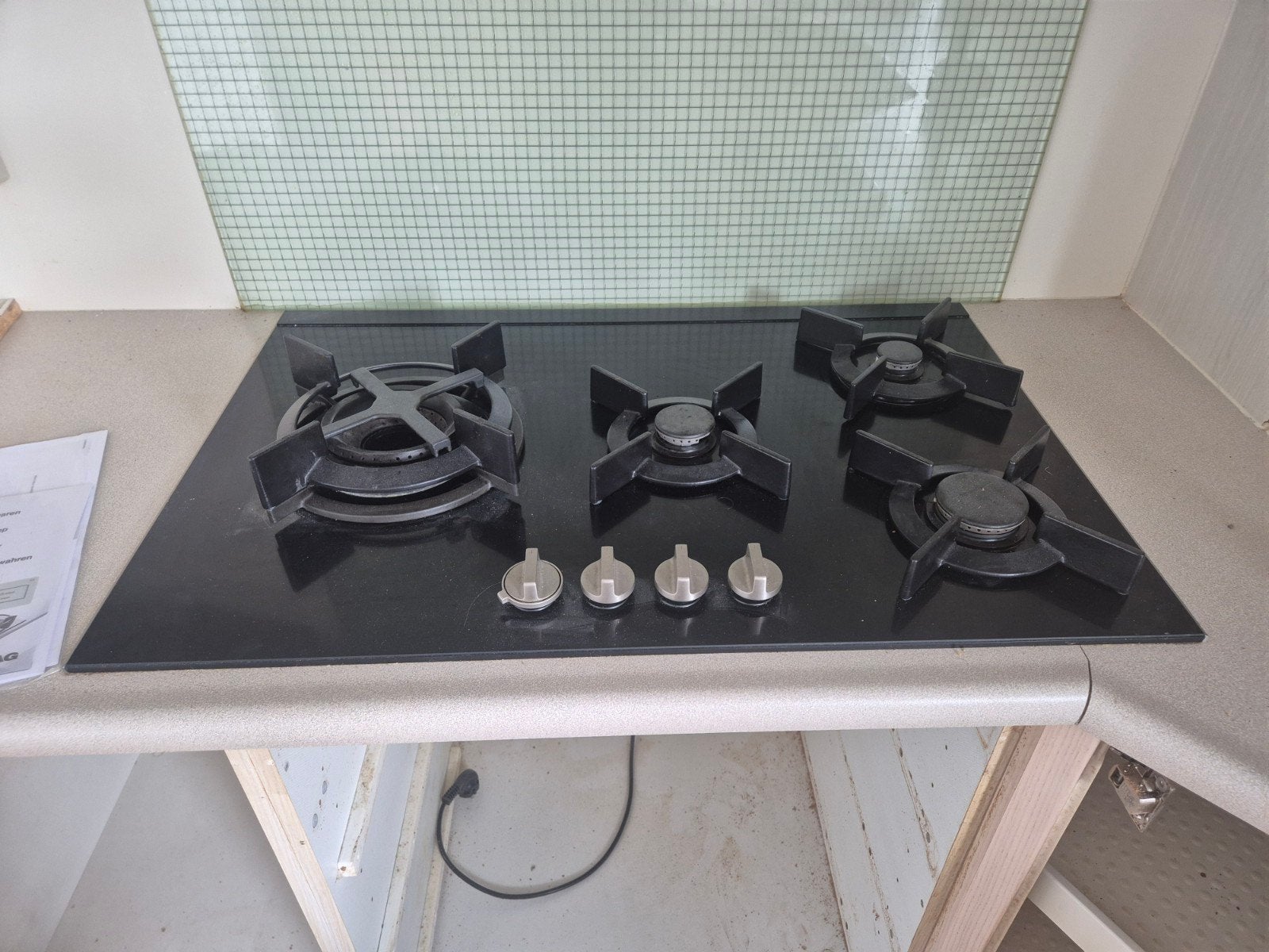 ATAG Gasfornuis 4-pits, Zwart Glas, Zo goed als nieuw, Ophalen, Gebruikt, 4 kookzones, Inbouw