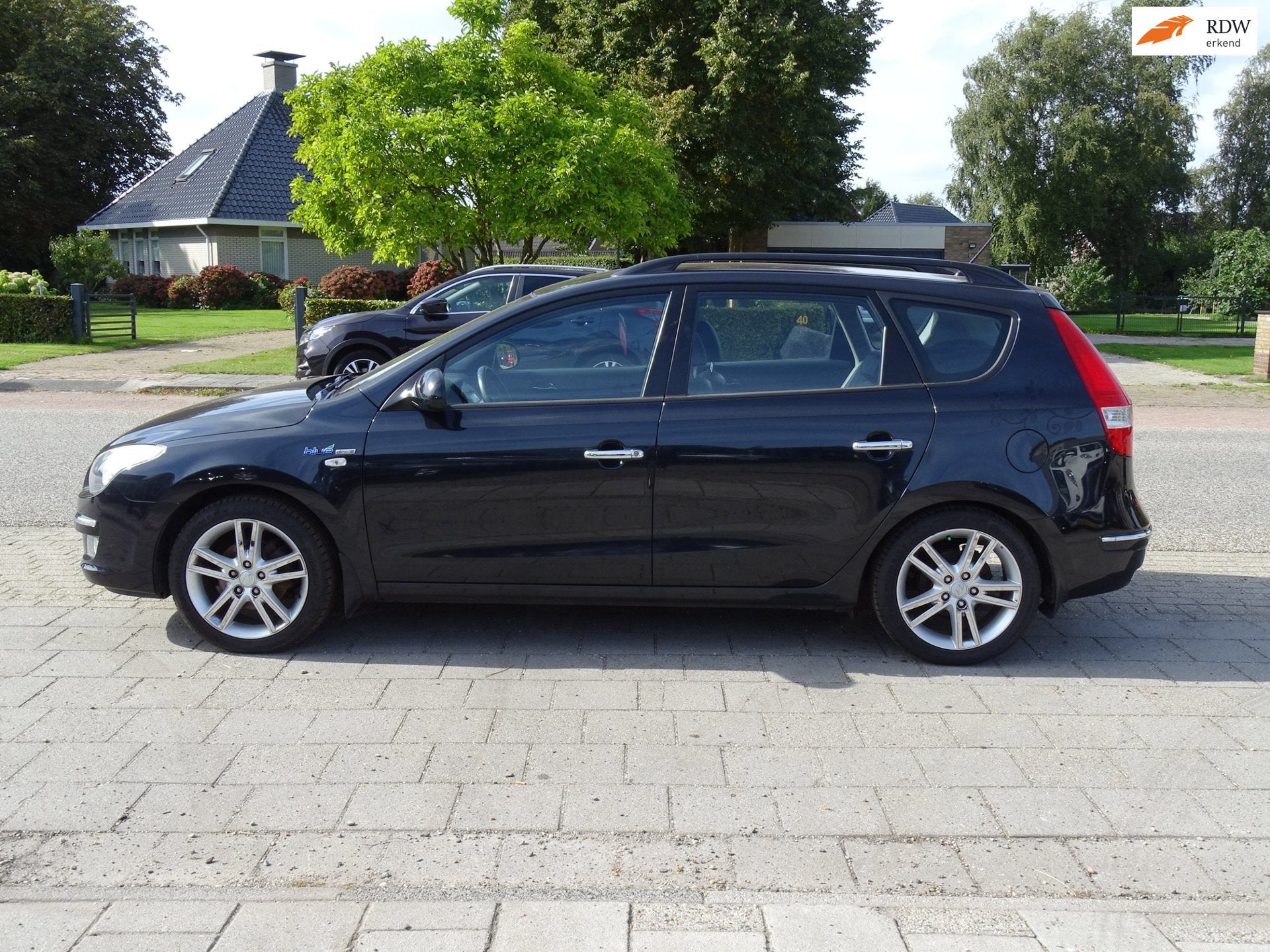 Hyundai I30 CW 1.6i Blue Dynamic, Auto's, 1591 cc, 4 cilinders, Zwart, Origineel Nederlands