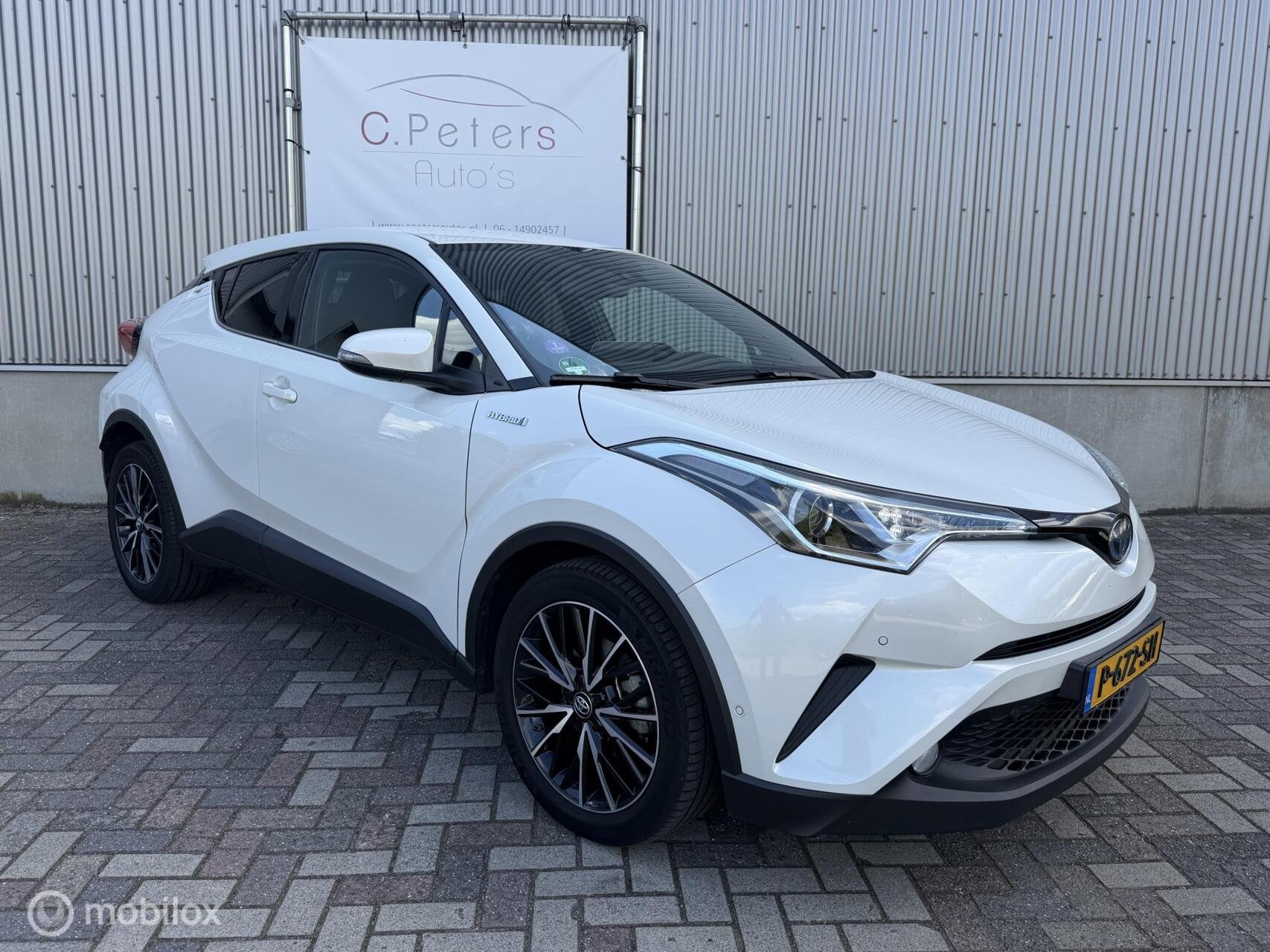 Toyota C-HR 1.8 Hybrid Dynamic 2018 / Camera / Leder / Keyle, Auto's, Dealer onderhouden, Euro 6, 4 cilinders, Leder