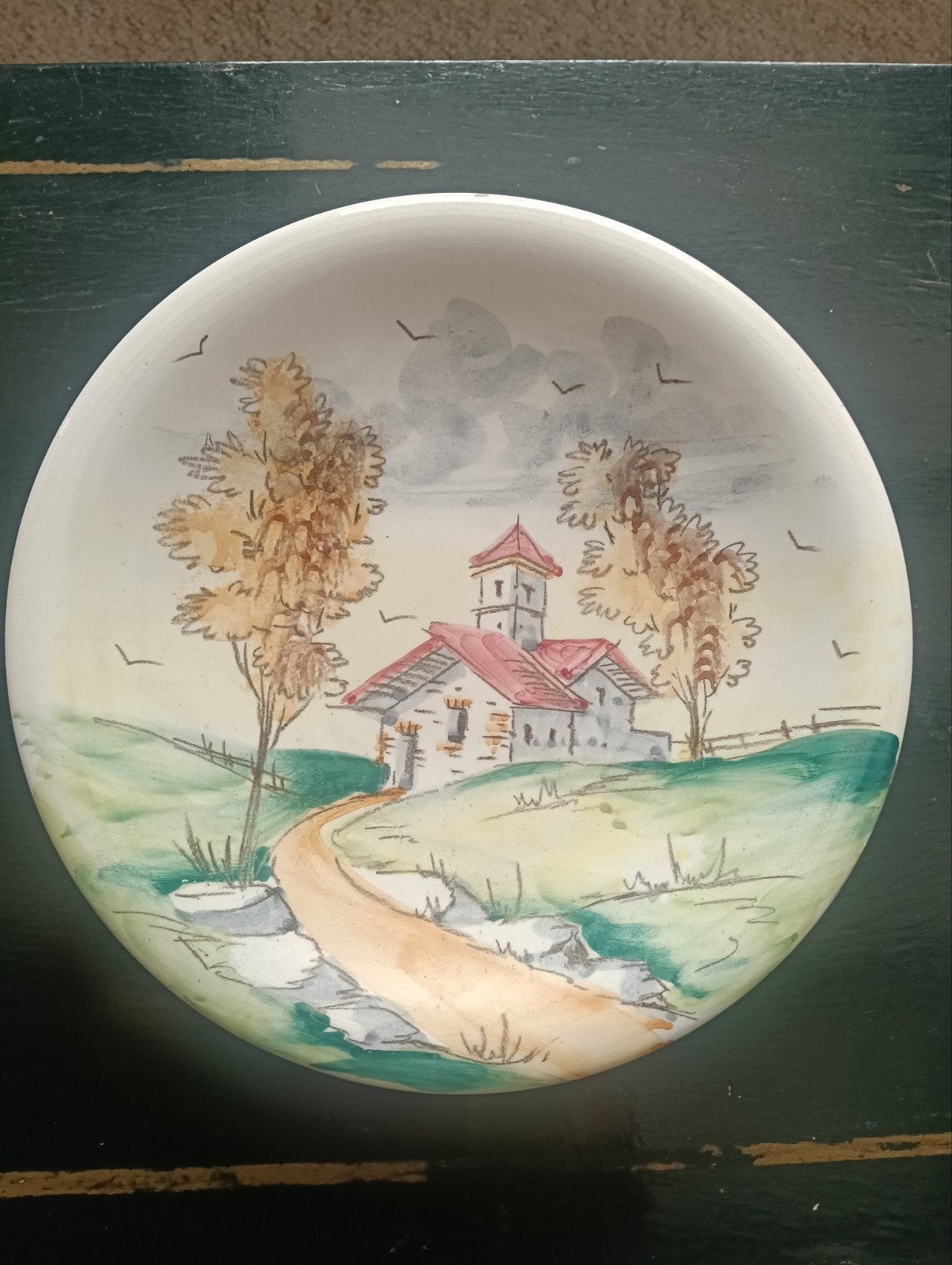wandbord met decoratief tafereel, Ophalen