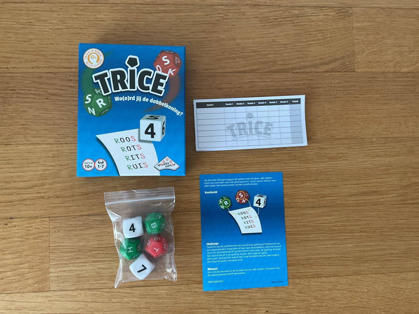 Trice dobbelspel - Wo(o)rd jij de dobbelkoning? Nieuwstaat., Een of twee spelers, Ophalen of Verzenden, Zo goed als nieuw