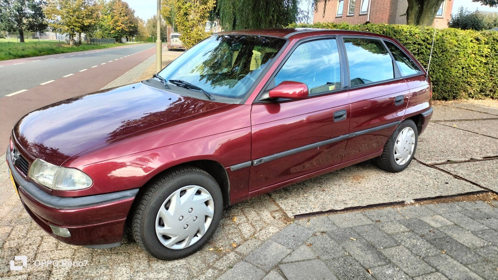 Opel Astra 1.6 I Tailgate AUT 1996 Rood, Auto's, Stof, 4 cilinders, Origineel Nederlands, 500 kg