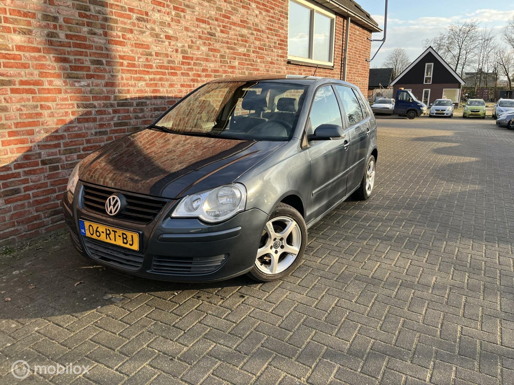Volkswagen Polo 1.4-16V, Auto's, Voorwielaandrijving, Blauw, Origineel Nederlands, Bedrijf