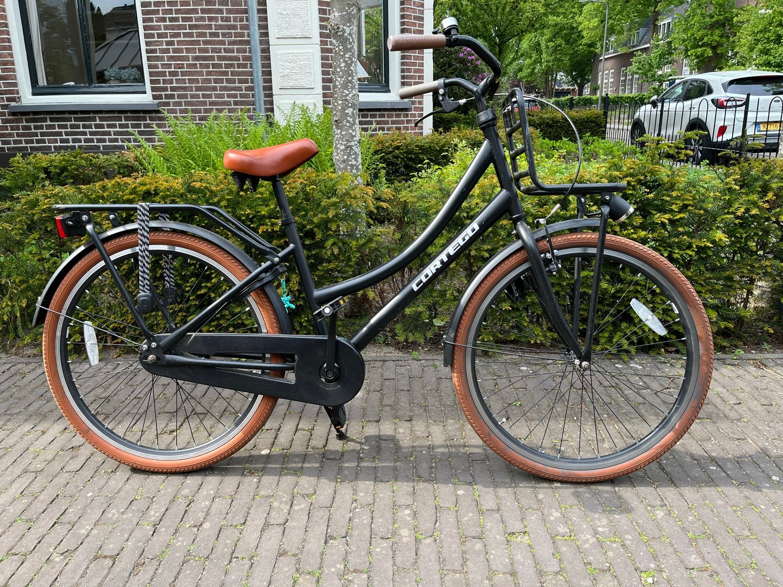 Cortego Transporter Meisjesfiets 26 inch Mat-Zwart, Fietsen en Brommers, Fietsen | Meisjes, Terugtraprem, Gebruikt, Handrem, Overige merken
