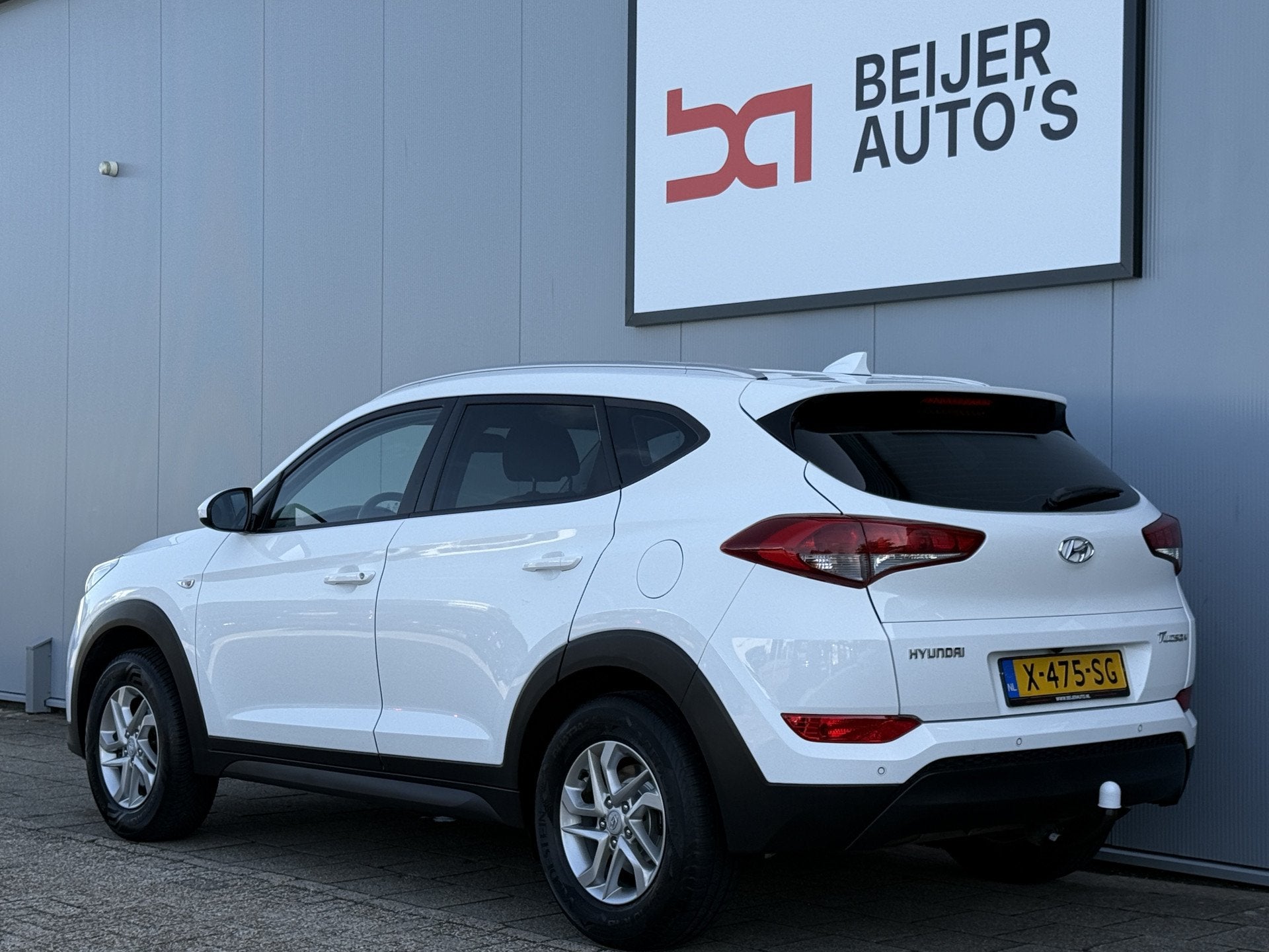 Hyundai Tucson 1.6 GDi i-Drive Trekhaak/Navi/Camera., Stof, Gebruikt, 4 cilinders, Grijs