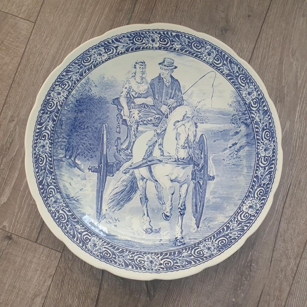Delfts blauw bord met koets, Ophalen
